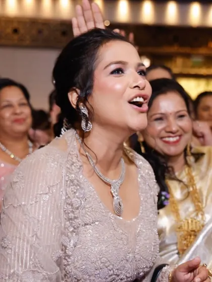 Capturing a moment of joy at a wedding event. Our makeup is designed to be long-lasting and radiant, ensuring our clients look fresh and glowing even while dancing the night away.