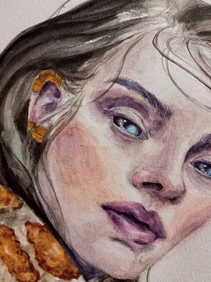 A duplicate detail shot of the subject's face, focusing on the watercolor technique.