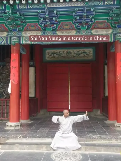 Practicing a low horse stance at the entrance of a temple in China. The architecture and atmosphere of these ancient grounds are a powerful reminder of our art's history.