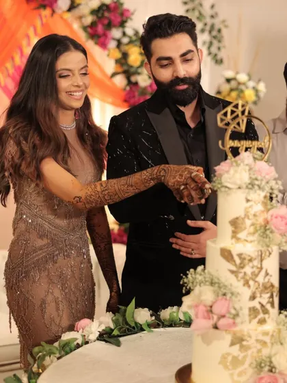 It's always an honor to see my cakes as part of such a special moment. Here is the happy couple cutting their engagement cake.