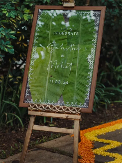 A close-up of the unique banana leaf welcome sign, showcasing its natural texture and elegant design.