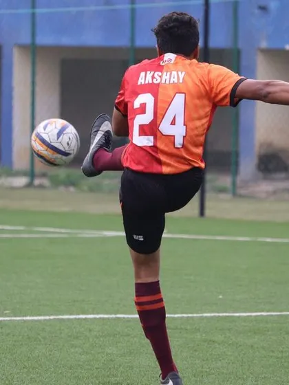 A player striking the ball with perfect technique. I am dedicated to honing the technical abilities of every player on my team.