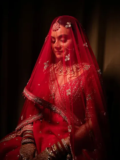 Portraits of my bride Sameera. I created a beautiful look that complemented her dusky skin tone and classic red lehenga.