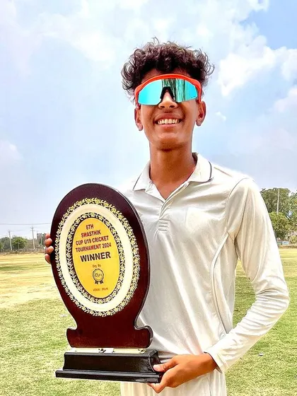 Another one of our smiling champions with his trophy.