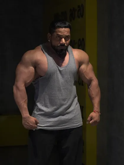 A front relaxed pose, showing my physique in a more natural stance.