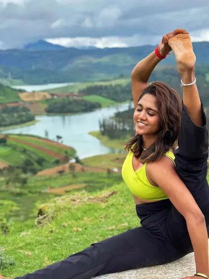 Yoga is the practice of quieting the mind and listening to your body. This pose, surrounded by nature, is a reminder of the joy and freedom we can find when we connect with ourselves through mindful movement.