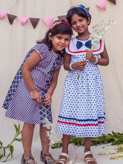 Two friends, two different styles. This image showcases the variety in my collection, from classic polka dots to modern mixed prints.