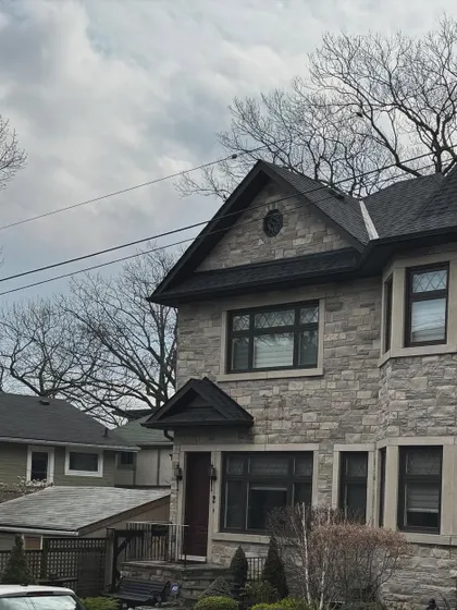 A photo of a house, capturing the mood of a quiet neighborhood.