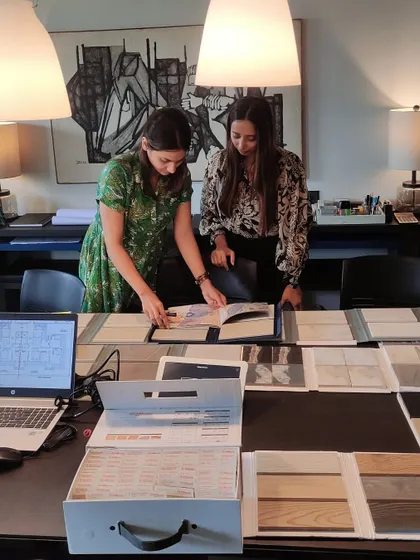 Our design process is a dialogue. It begins with listening and evolves through collaboration, as seen here with our team curating materials and textures. Every choice is a deliberate step toward realizing a vision that is both ours and yours, ensuring the final space feels authentic and personal.