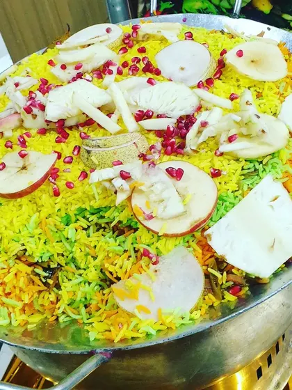 My culinary range goes beyond the usual, including specialty dishes like this Kashmiri Pulao. It's a colorful and flavorful rice dish, generously garnished with fresh fruits, nuts, and pomegranate seeds, offering a unique taste for your event.