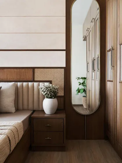 Another angle of the parent's bedroom, highlighting the harmony between the bed, nightstand, and wardrobe design.