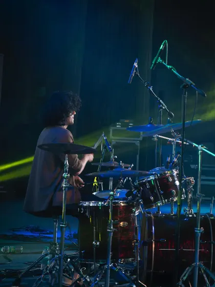 The powerhouse behind the band. Our drummer provides the solid foundation for all our rock anthems and groovy tracks.