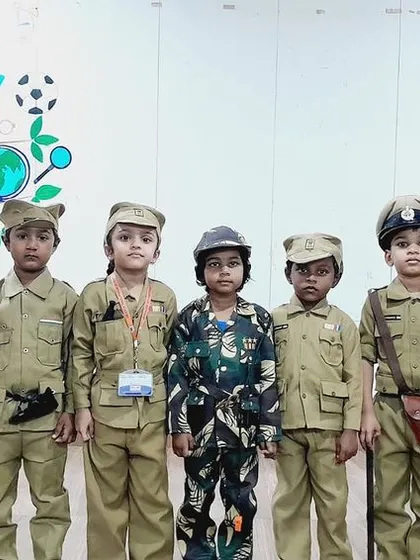 Our future police force stands tall and proud in their uniforms during the Community Helpers Day event.