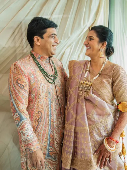 Styling isn't just for the bride and groom. I had a wonderful time creating these coordinated looks for the parents. The father's paisley print sherwani and the mother's elegant saree with statement jewelry created a sophisticated and unified look for the wedding day.