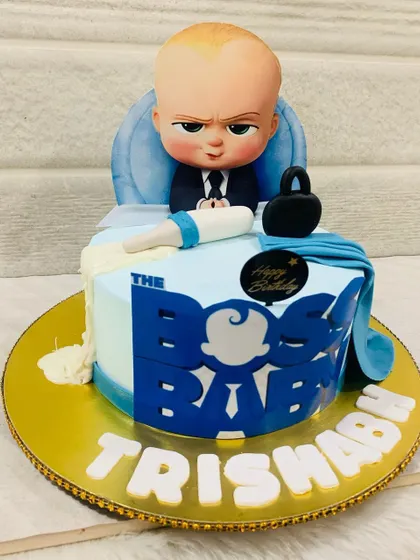 Another angle of the Boss Baby cake, showing the detailed fondant work and the fun theme that's perfect for a first birthday.