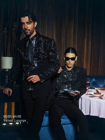 Last round, midnight mood. Every thread speaks volumes on these black sequined suits, from the sharp tailoring to the power shoulders. They didn't just dress for the night; they owned it.