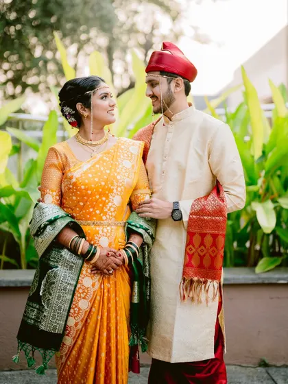A classic portrait of the couple, their smiles reflecting the happiness of the day.