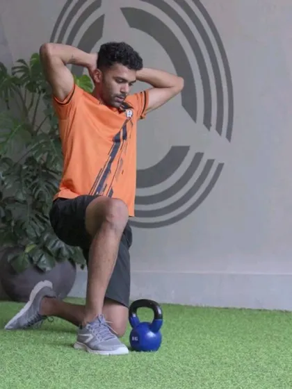 Demonstrations of various hip flexor drills using a foam roller and kettlebell to release tightness and build strength.