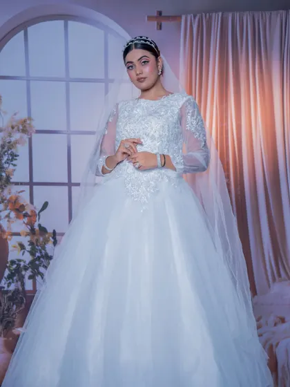 For my Christian brides, I aim for a look that is both timeless and modern. This elegant style features soft, glowing makeup and a classic updo, perfectly complementing the beautiful white gown and veil for a truly angelic appearance on her special day.