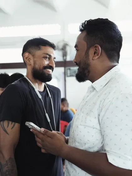 Discussing matchmaking and strategy during a DFL event. Building a successful fight league requires teamwork and a deep understanding of the sport.