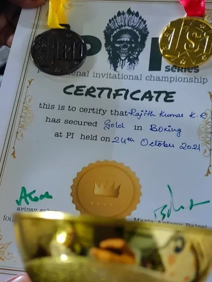 A certificate and medal from the Phenomenal Invitational Series. These awards represent the hard work and successful performance of our fighters in competitive events.