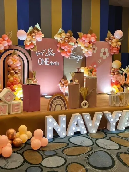 A beautiful and modern 'Isn't She ONEderful' themed birthday. The dusty rose and peach color palette, along with the boho rainbow arches, create a very trendy look.