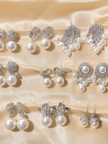 Pick your favorite pearls. This image shows a variety of my statement pearl earrings, perfect for adding a touch of elegance to any outfit.