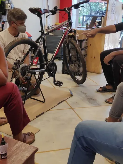 Participants watch closely as we go through the steps of basic bike care. These workshops are perfect for new cyclists or anyone looking to become more hands-on.