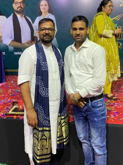 Standing with a fellow artist and mentor. I believe in building strong relationships within the artist community.