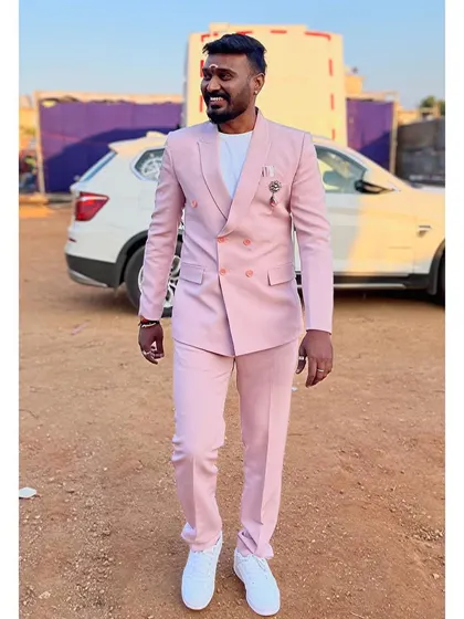 A stylish pink suit for the 'Gichchi Giligili' event in Chamarajanagar.