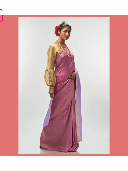 A full-length view of the pink and lavender silk linen saree, a perfect example of the quiet sophistication that defines the Aadya collection.