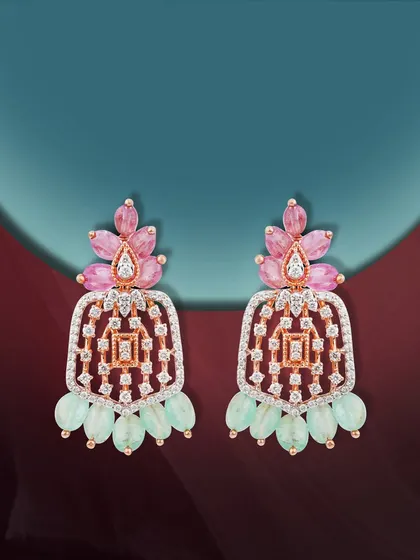 Rose gold glows, diamonds whisper, and colors sing. Our Pride of the Bride earrings capture the essence of her story, radiant in every glance with pink and green gemstones.