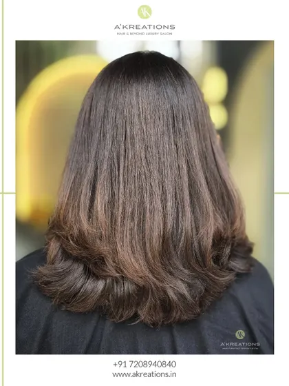 The back view of the no-bleach light brown balayage, showcasing the healthy shine and soft, blended color.