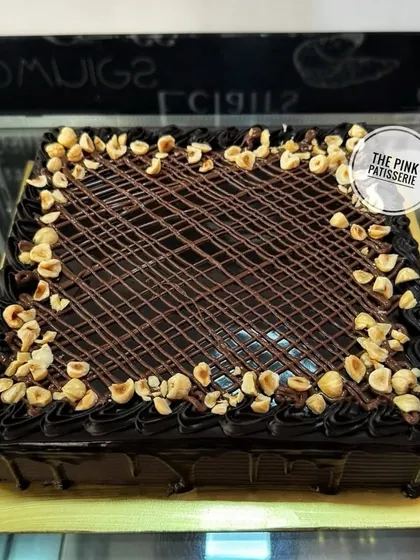 A large, rectangular chocolate hazelnut cake, perfect for serving a crowd.