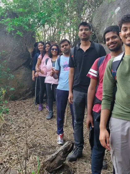 A team lines up on a narrow forest trail during the Bananthimari trek, showing the guided and organized nature of our adventures.