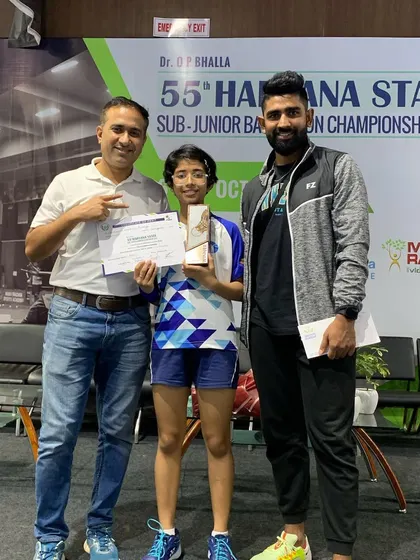 A proud moment with Nandini Acharya after she was crowned the U-11 Girl's Singles Champion at the 2022 Haryana Sub-Junior State Championship.