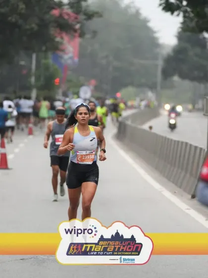 Running through the streets of Bengaluru during the half marathon. Racing in my home city is always special. This was a strong training run that ended with a podium finish, proving that consistency pays off.