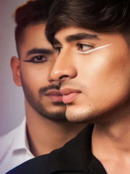 Makeup knows no gender. Here, I've created contrasting black and white graphic eyeliner looks on male models, showcasing how makeup can be used as a form of expression for everyone.