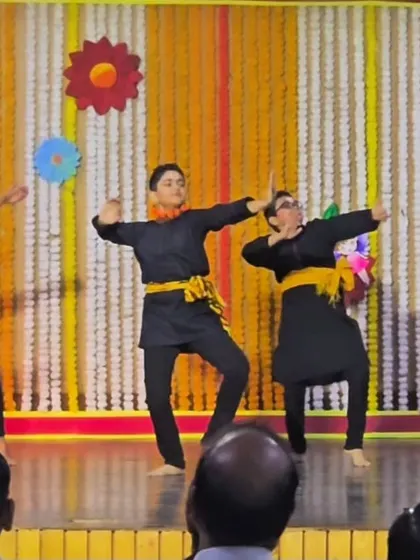 My students performing a synchronized sequence on stage, showcasing the skills they have learned in their classical dance classes.