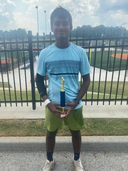 Our training programs prepare players for global competition. Here is Ishaan Yadlapalli after his victory at the UTR Masters Tennis Championship in Atlanta, USA, proving his skills on an international platform.