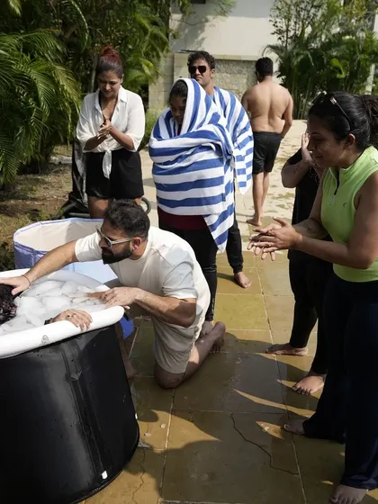 You are never alone in your fear. During the ice bath and other challenging exercises at the retreat, you are held and supported by the entire community. This is what a safe space for transformation looks like.