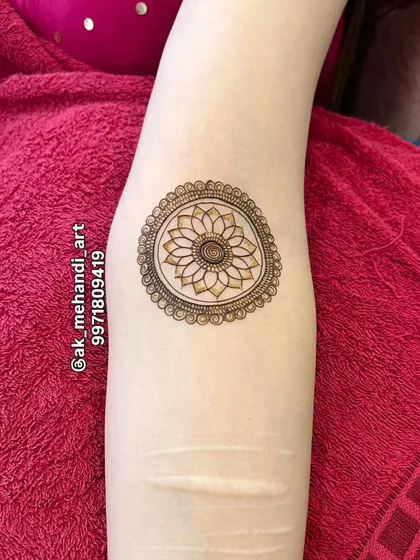 This is the starting point, a simple floral mandala outline. From this, we build up the entire complex design seen in the previous image.
