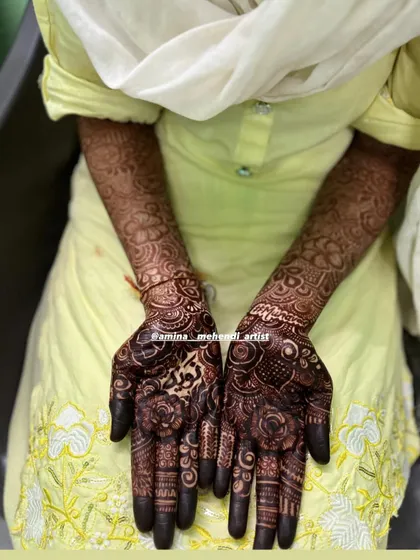 A simple and elegant shot of a completed bridal mehendi, showcasing the dark, fresh paste.