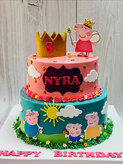 An oink-tastic celebration for Nyra's 3rd birthday! This two-tier Peppa Pig cake is bright, cheerful, and perfect for bringing smiles to little faces.