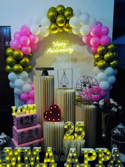 A heartfelt 25th anniversary celebration for 'Amma Appa'. The marquee letters add a personal touch to the beautiful balloon arch and decorative props.