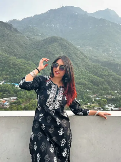 Adding sunglasses to my ethnic travel look. This simple accessory gives the outfit a modern and cool twist.