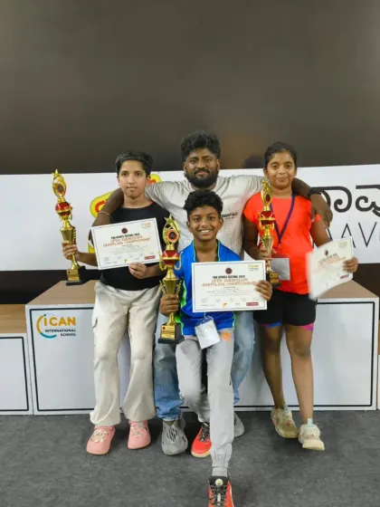 Our kids' team showing off their trophies and certificates with their coach. We are building a strong foundation for the future of combat sports in Karnataka, starting with these young champions.