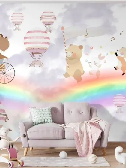 A full room view of the whimsical rainbow and animal wallpaper, perfect for a nursery or playroom.