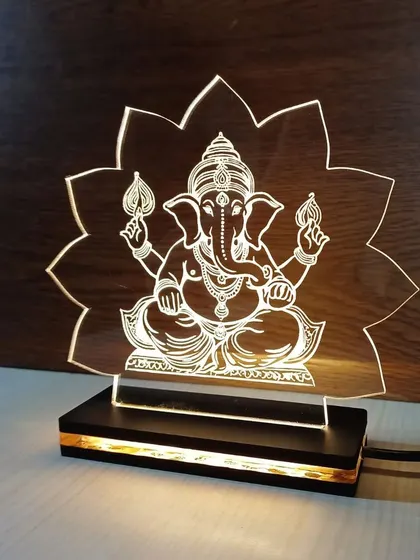 This LED lamp featuring Lord Ganesha is a perfect gift for Diwali or a housewarming. The intricate design is beautifully illuminated.