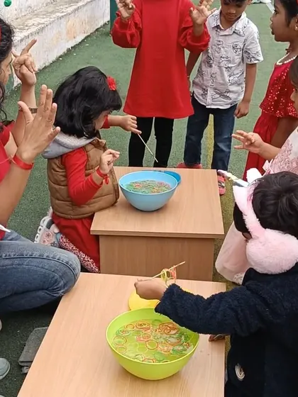 A fine motor skills game at our Christmas carnival, combining fun with skill development.